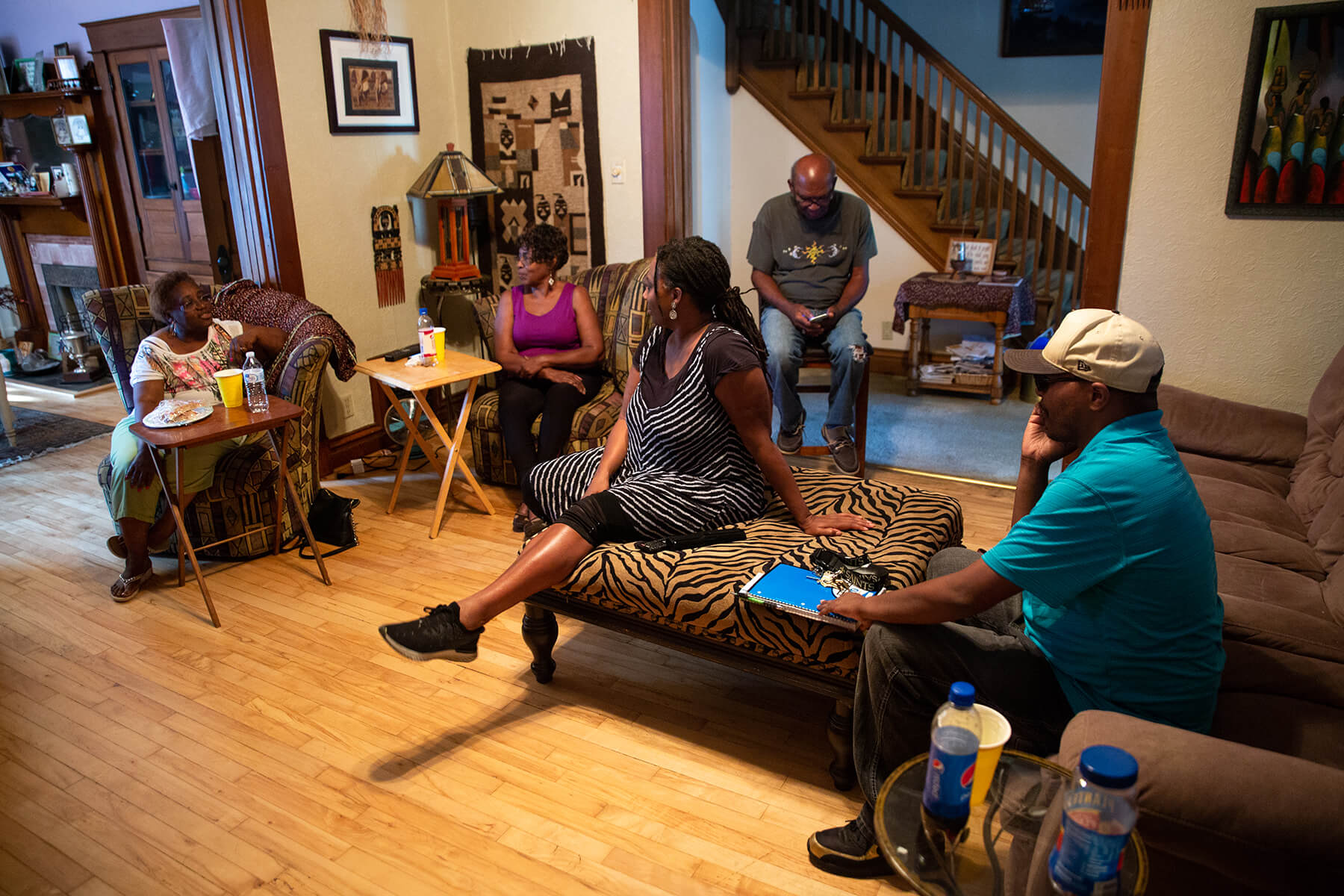 Pictured left to right: Paulette Booker, Octavia Payne, Ursula Payne, Carl Booker and James Burley, Jr., in Ursula Payne’s New Castle home. Octavia Payne is a retired educator and co-founder of the Diamond Girls youth program in New Castle. Her daughter Ursula is the chairperson of the Department of Dance and director of the Frederick Douglass Institute at Slippery Rock University. Paulette and Carl Booker are close relatives of the Paynes, and James Burley Jr. is a friend and former classmate of Ursula Payne.