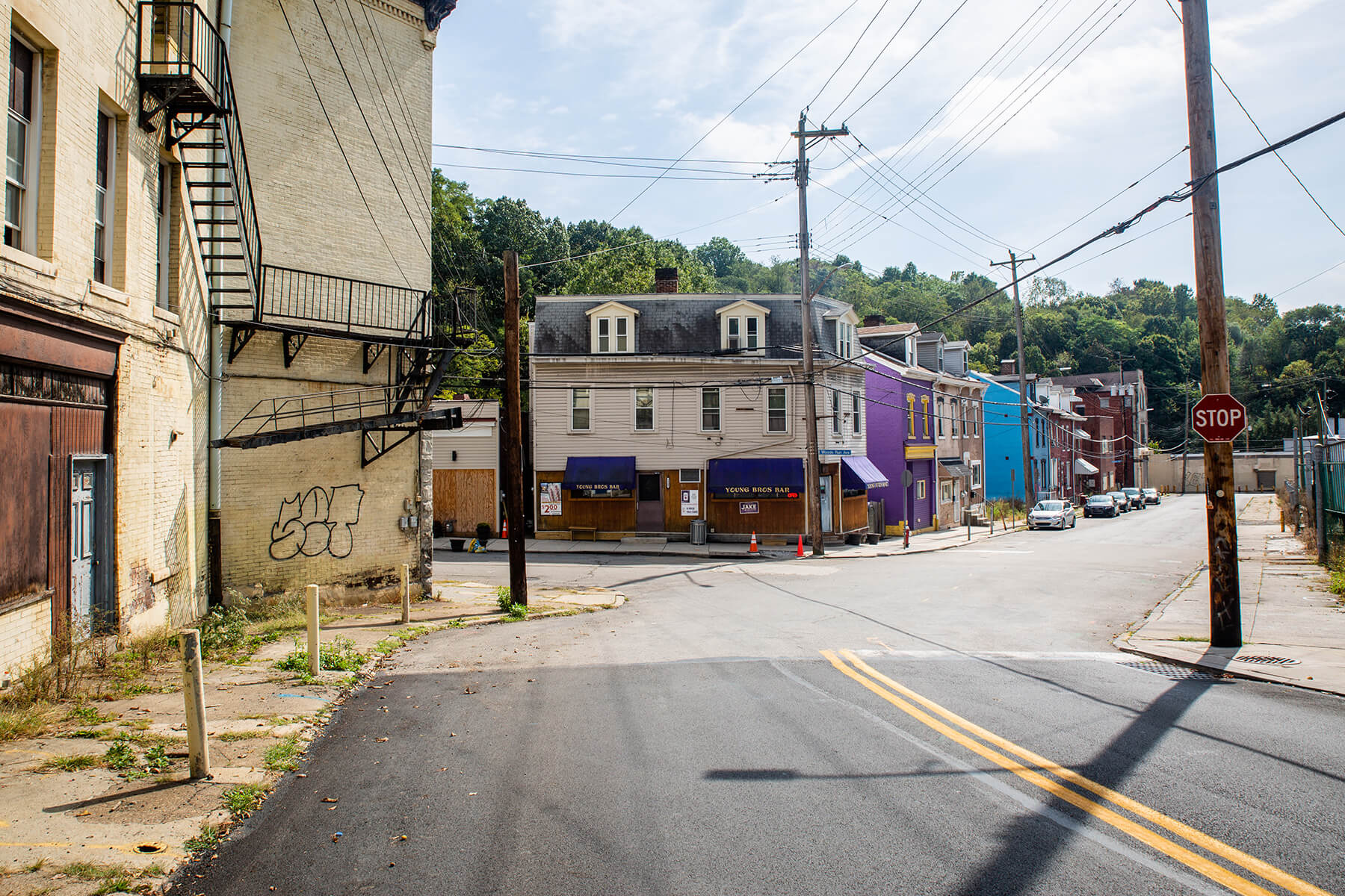 Jamie Younger owns and operates Young Brothers Bar, pictured on the corner of Woods Run and McClure avenues, on the border of the Woods Run and Brighton Heights neighborhoods of Pittsburgh. Young Brothers sits about a mile from the county’s ALCOSAN water treatment facility.