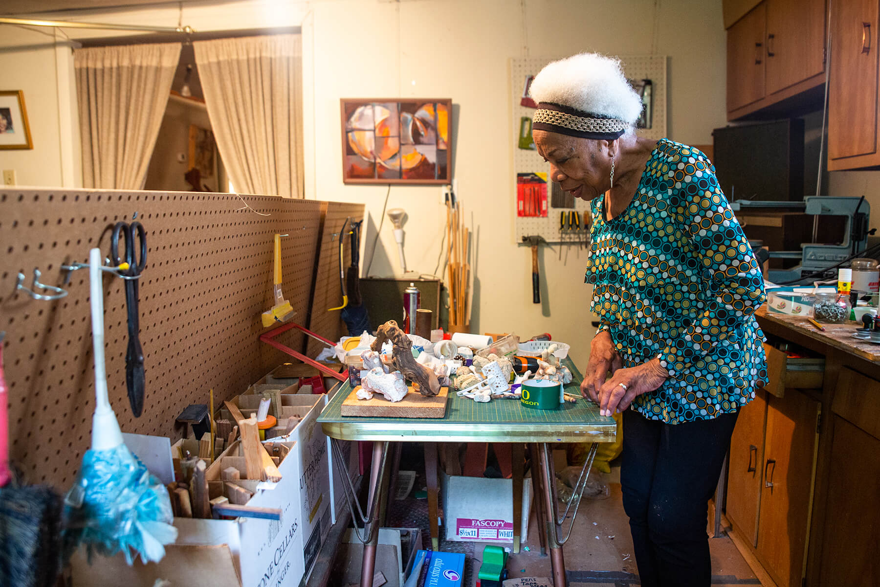 Elizabeth “Betty” Asche Douglas is an art-culture historian, retired professor, artist and jazz performer. Here she is pictured in her studio in Rochester, Pa.