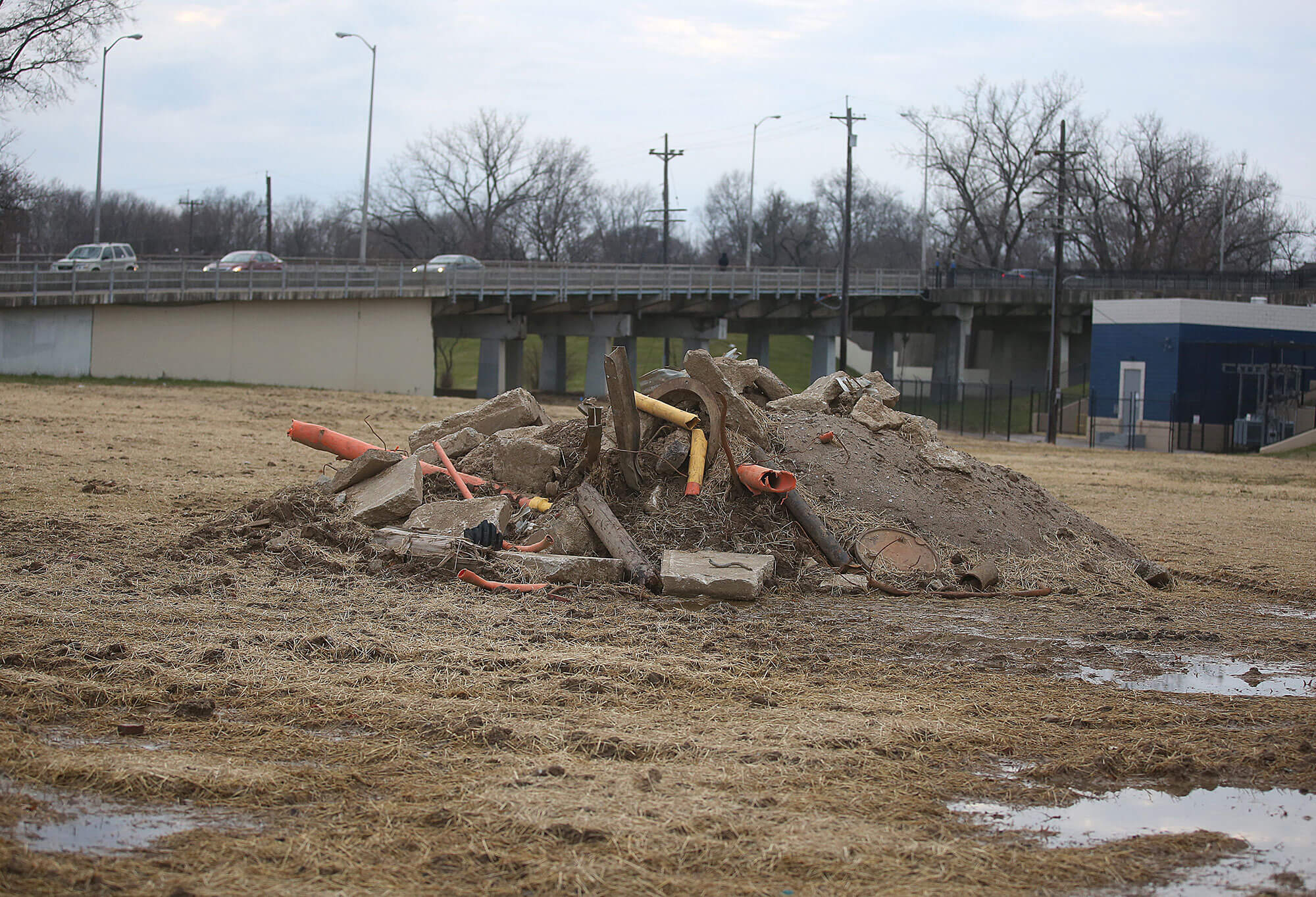 A pile of concrete sits in Newport, Kentucky, on Dec. 8, 2019.  A coalition is building more parks to increase greenspace and grass to absorb rainwater and reduce strain on outdated stormwater infrastructure. (Photo by Leigh Taylor/Eye on Ohio)