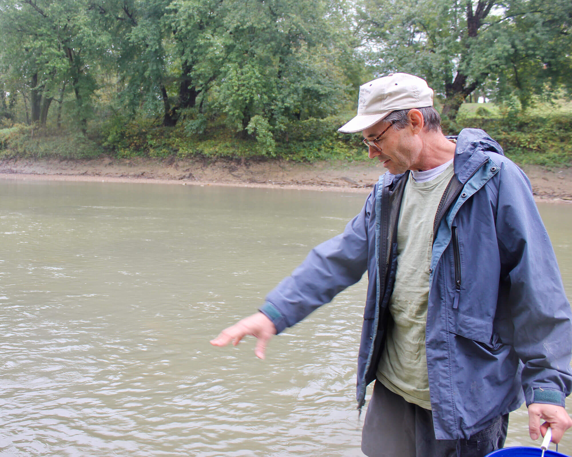 U.S. Forest Service Fisheries Research Biologist Wendell R. Haag talks about the freshwater mussels that live in this stretch of the Licking River near Butler, Kentucky. (Photo by Carrie Blackmore Smith/PublicSource)