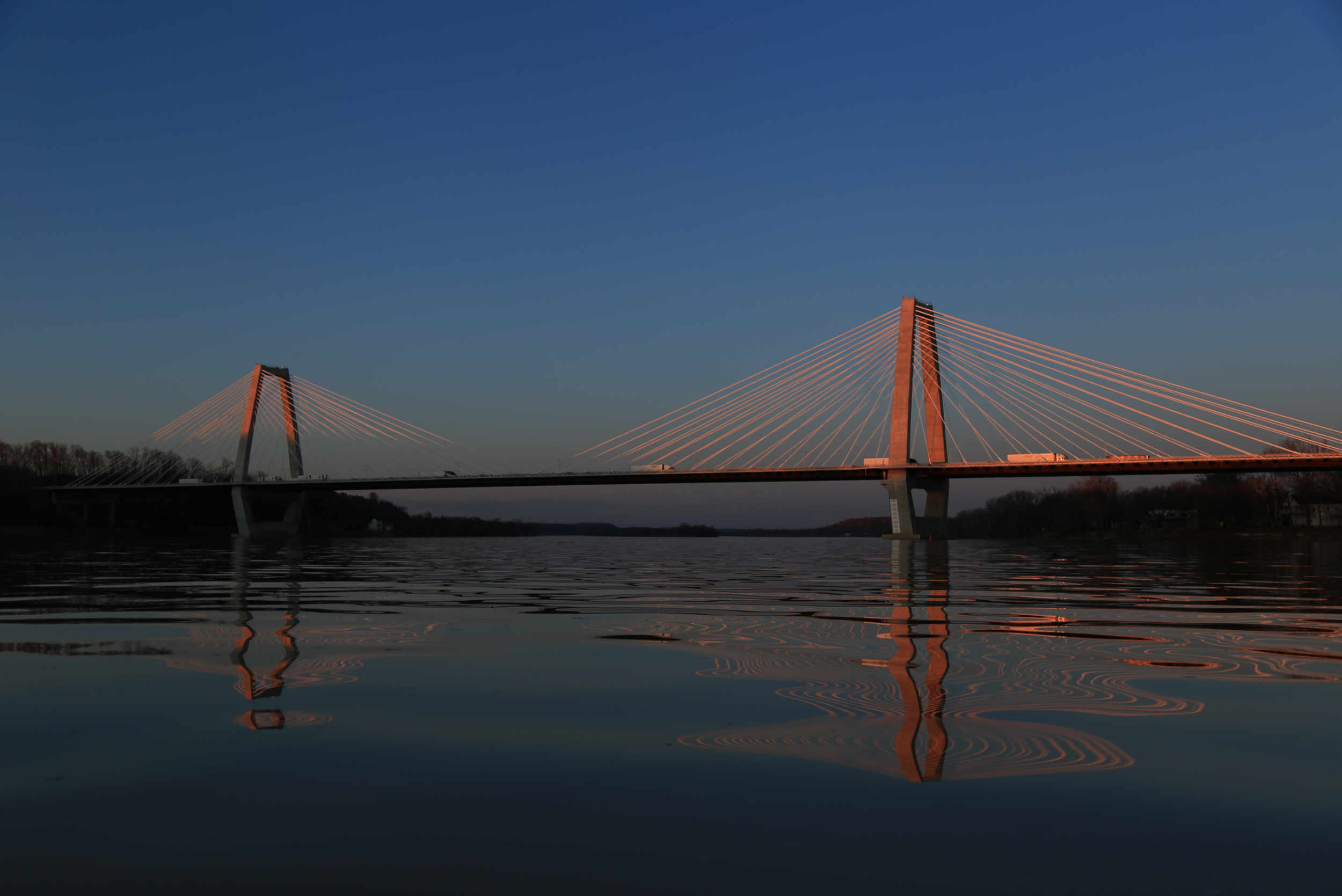 The East End Bridge in north Louisville during an Ohio River sunset. (Photo by Ryan Van Velzer/WFPL)