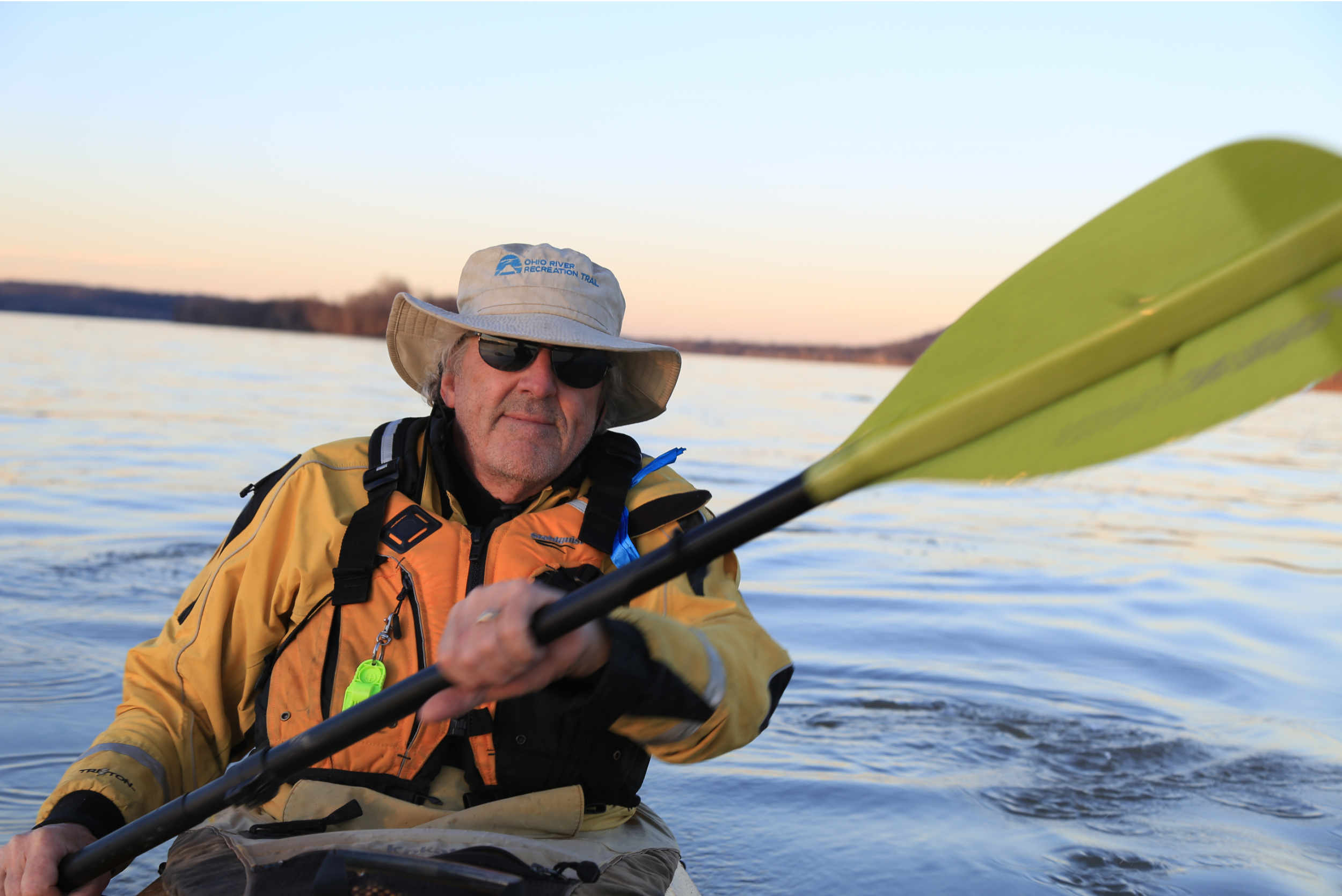 Educator and environmentalist David Wicks paddling on the Ohio River near Prospect, Kentucky. (Photo by Ryan Van Velzer/WFPL)